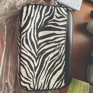 Michael Kors jet set charm crossbody black and white tiger pront